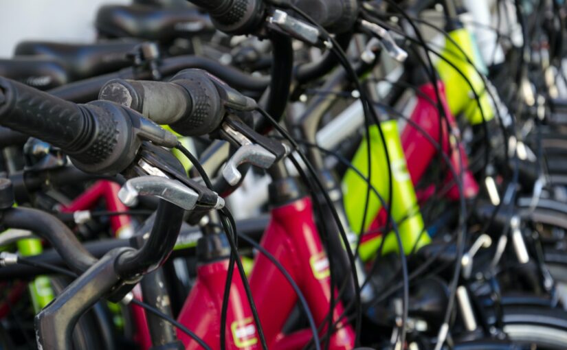 pile of red and green bicycles