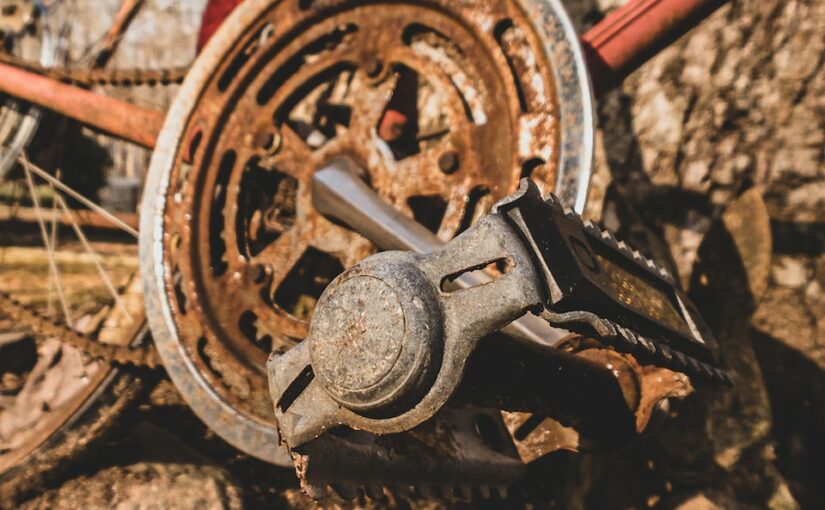 brown and black wheel on brown soil