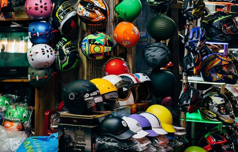 assorted color helmet on display