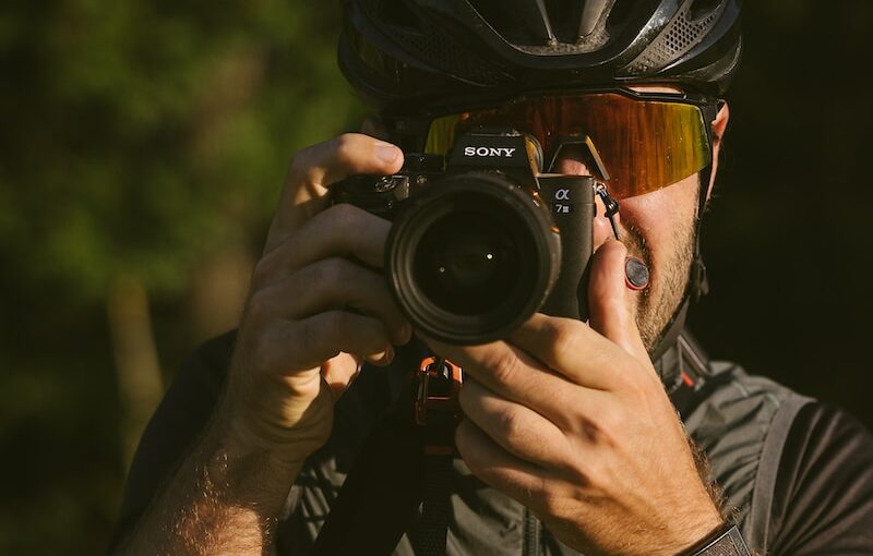 a man taking a picture of himself with a camera